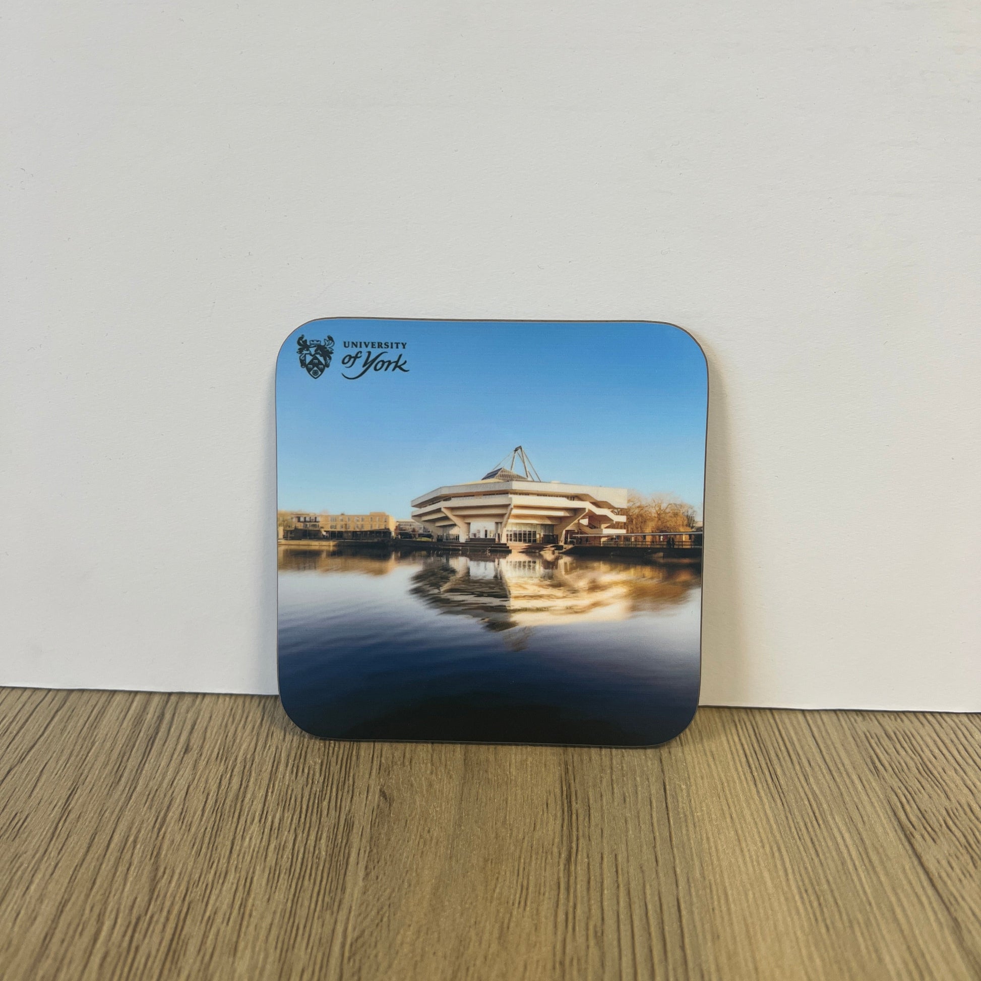 Coaster with ship design on a white surface